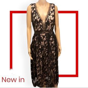 Aqua Black and Nude dress with floral lace and vneck and deep v in the back.